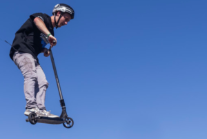 overhead capture of a pro rider scooter on air