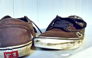 worn out brown skate shoes