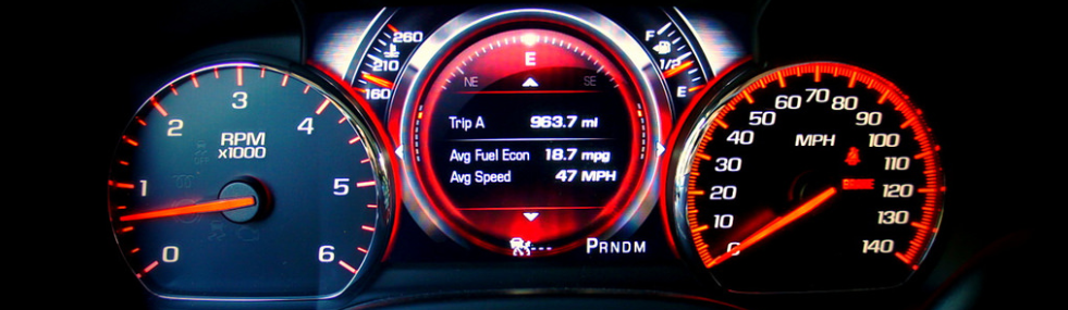 driver's gauges on speed and acceleration