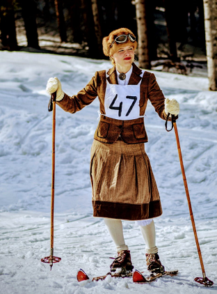 lady wearing brown dress while skiing