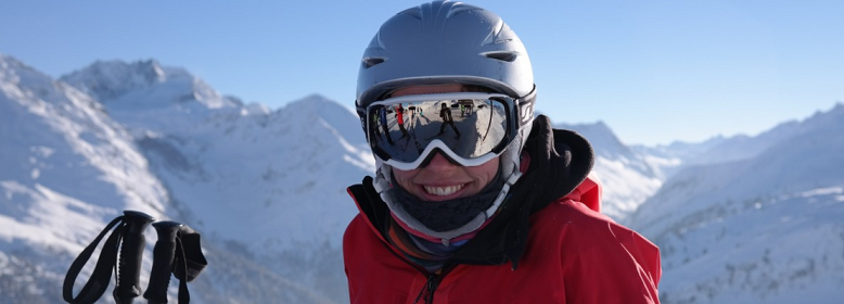 snoarboarder wearing helmet and goggles