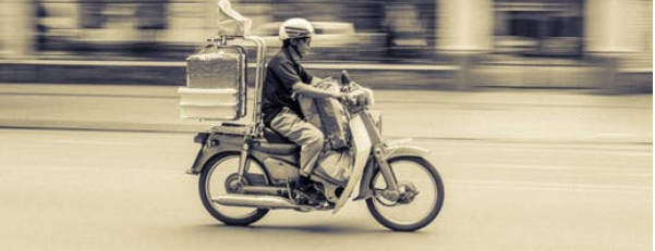 speeding scooter on a silent street