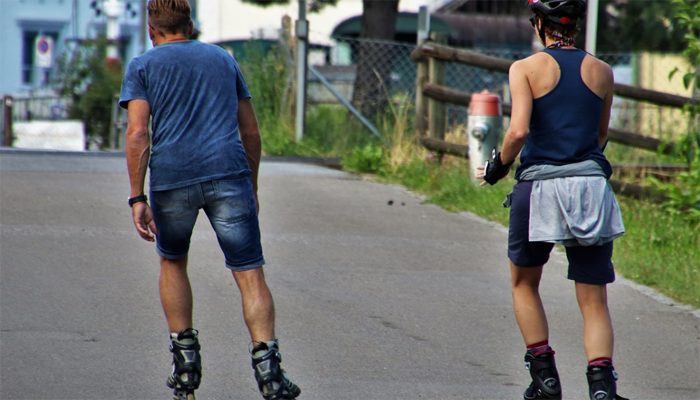 Two person roller skating