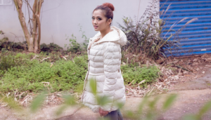 Woman wearing white down jacket