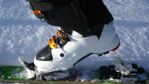 Persons feet on a ski binding