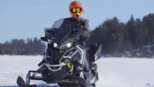 Person riding on a snowmobile